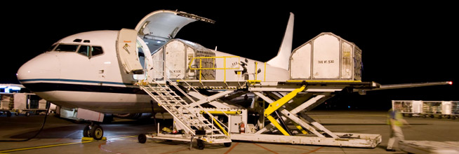 Cargo aircraft being loaded for an air freight charter from New York